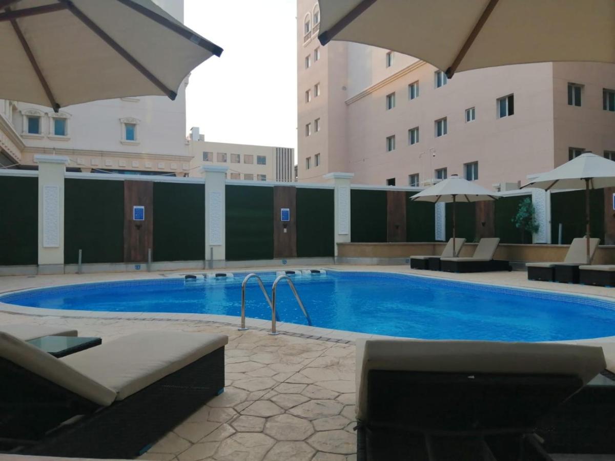 New Blue Rose Hotel Доха Екстериор снимка